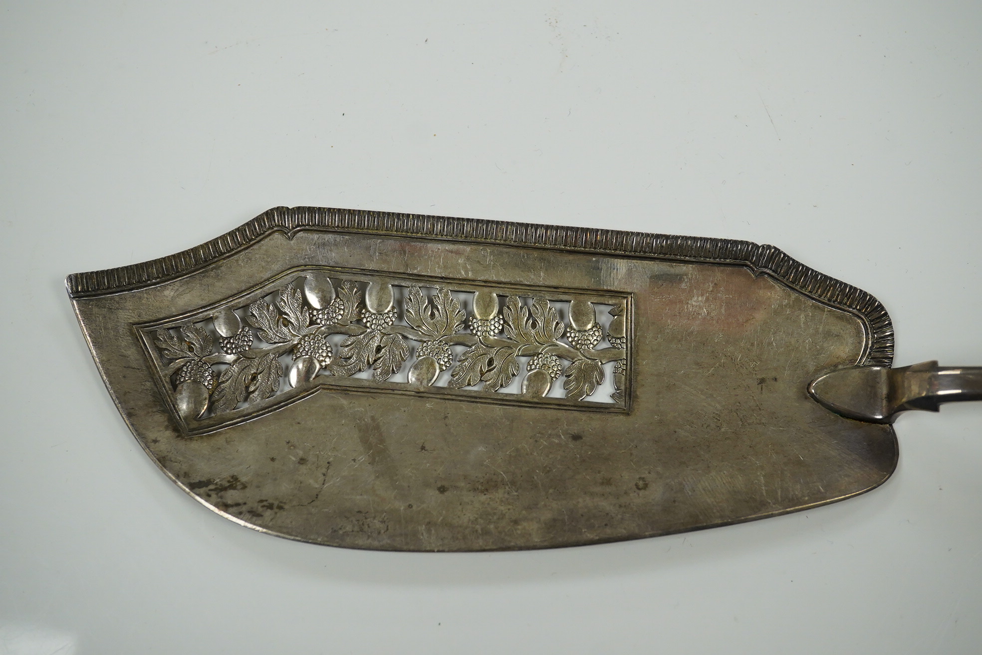 A George III silver fiddle pattern fish slice, William & Samuel Knight, London, 1813, 30.4cm, 136 grams. Condition - fair